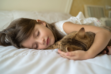 What Does Research Say About Sleeping with Pets?